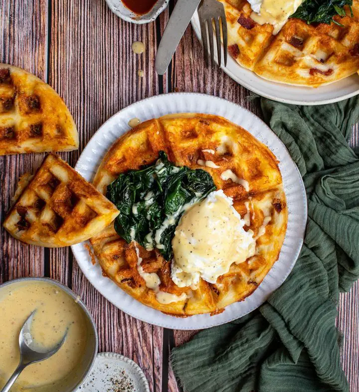 eggs florentine on bacon and cheese waffles