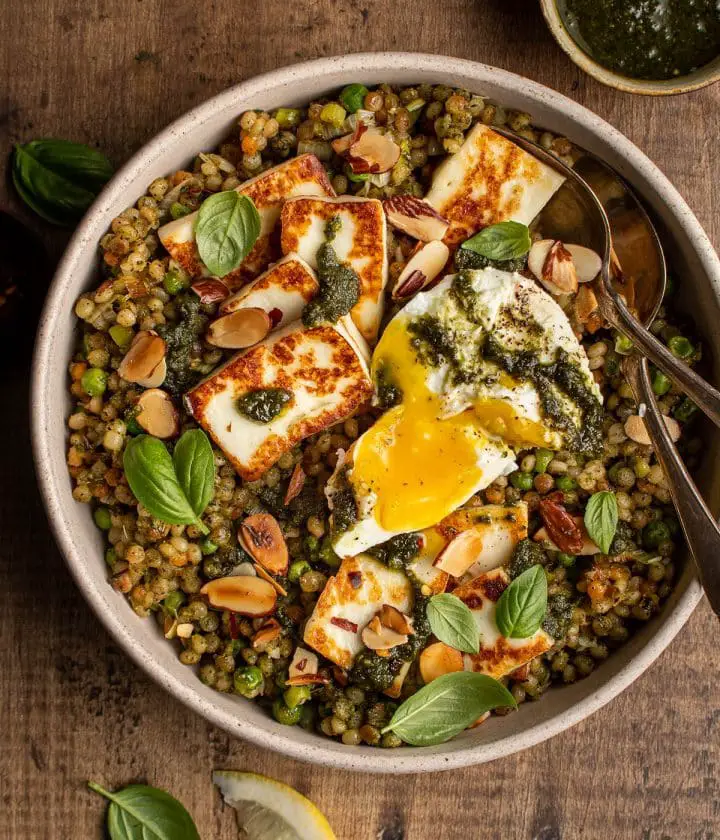 couscous bowl with halloumi and poached egg