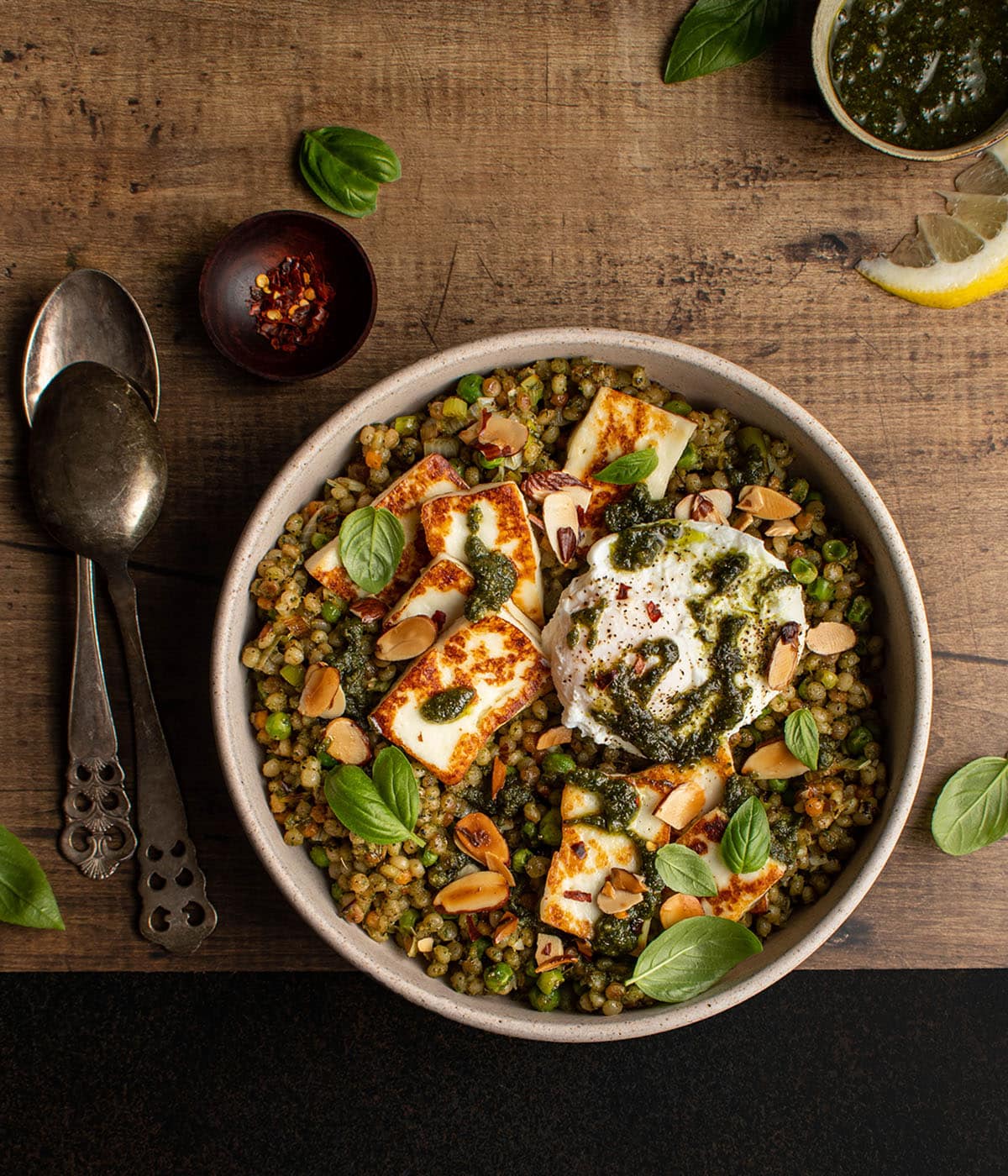 couscous bowl with halloumi and poached egg