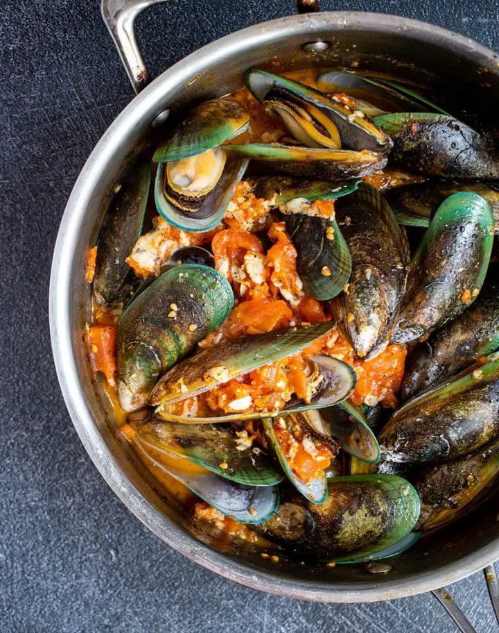 cook the mussels in sauce