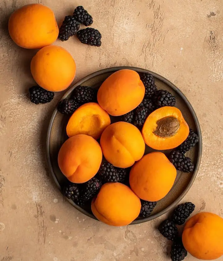 fresh apricots and blackberries